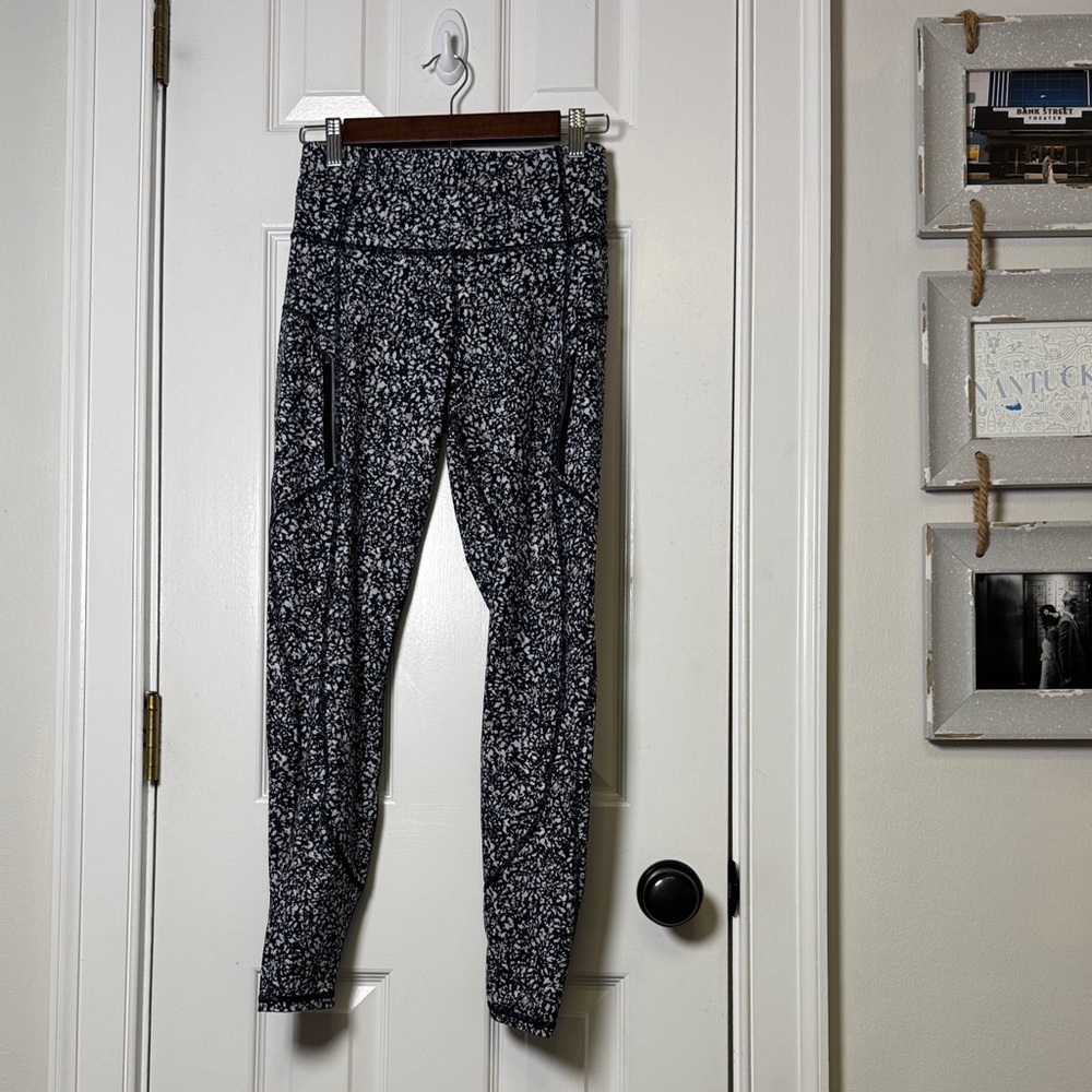 Athleta Rainier Tight Fleece Lined Leggings Zip Pockets Black Print Size S - Picture 2 of 10